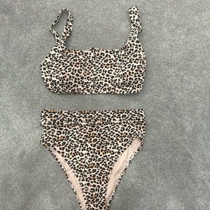 Women bikini. High waisted/cheeky bottoms. Full coverage top.